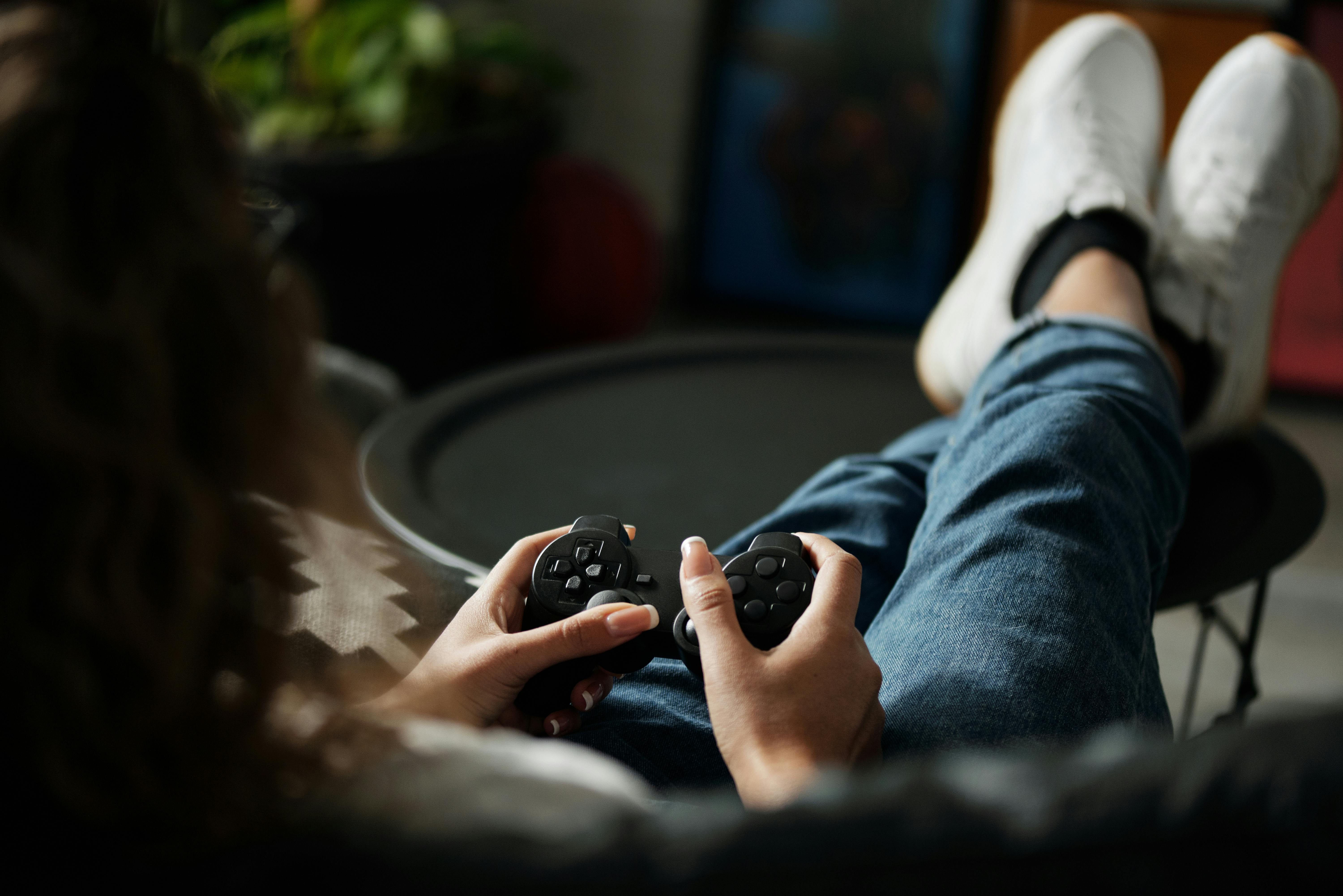 person relaxing playing videogame